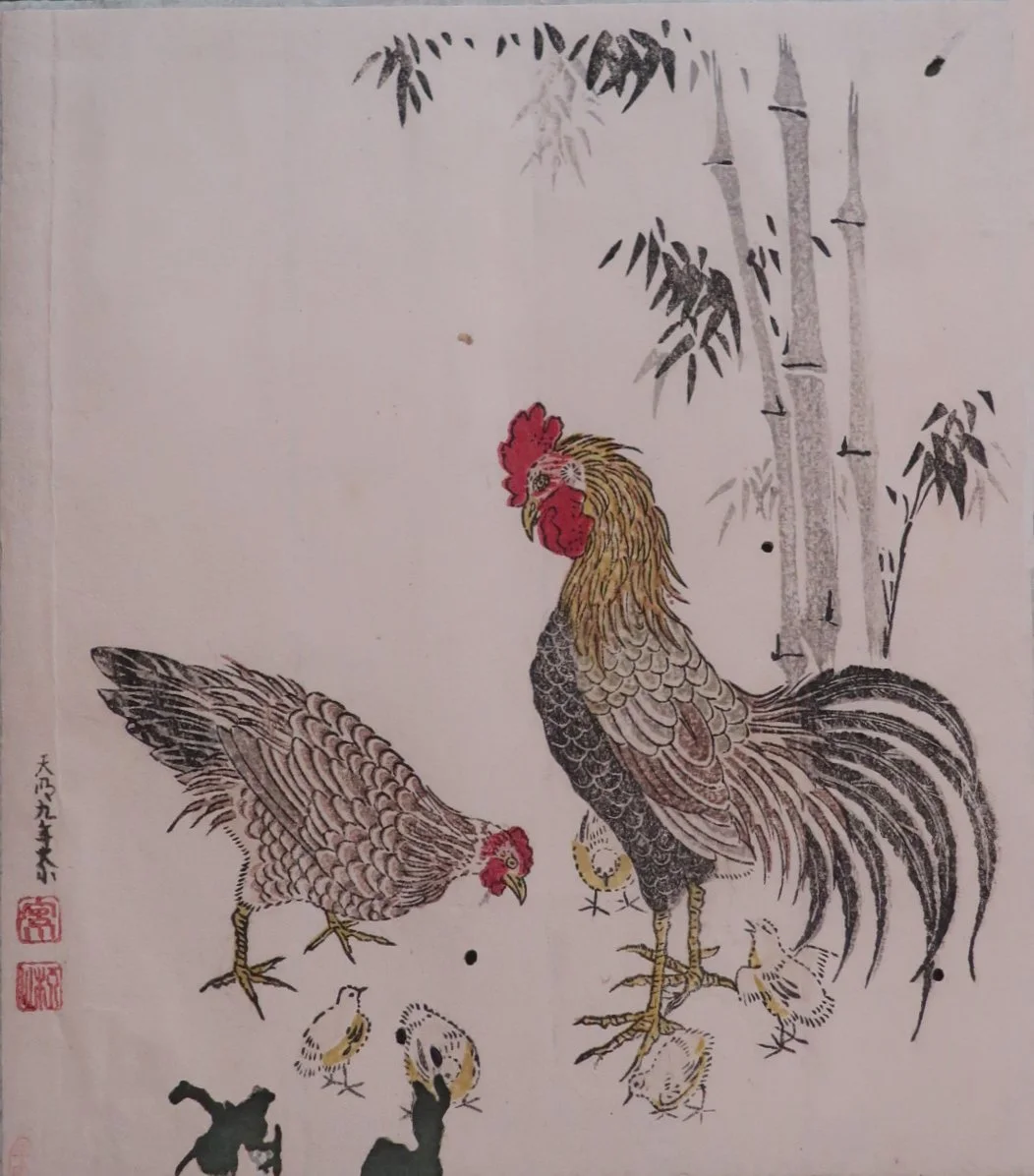 Traditional Japanese calendar scroll displaying the 24 solar terms with seasonal illustrations and kanji characters marking the year's divisions.
