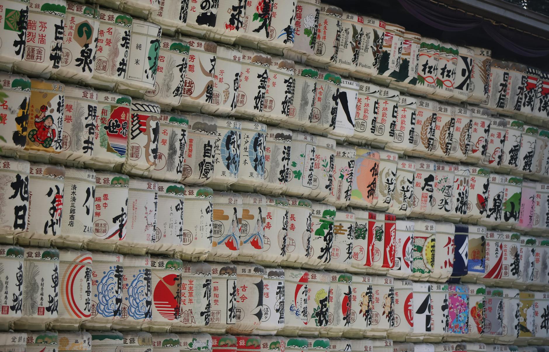 Traditional Japanese fermented foods including miso paste, soy sauce, natto, and pickled vegetables arranged on a wooden table.