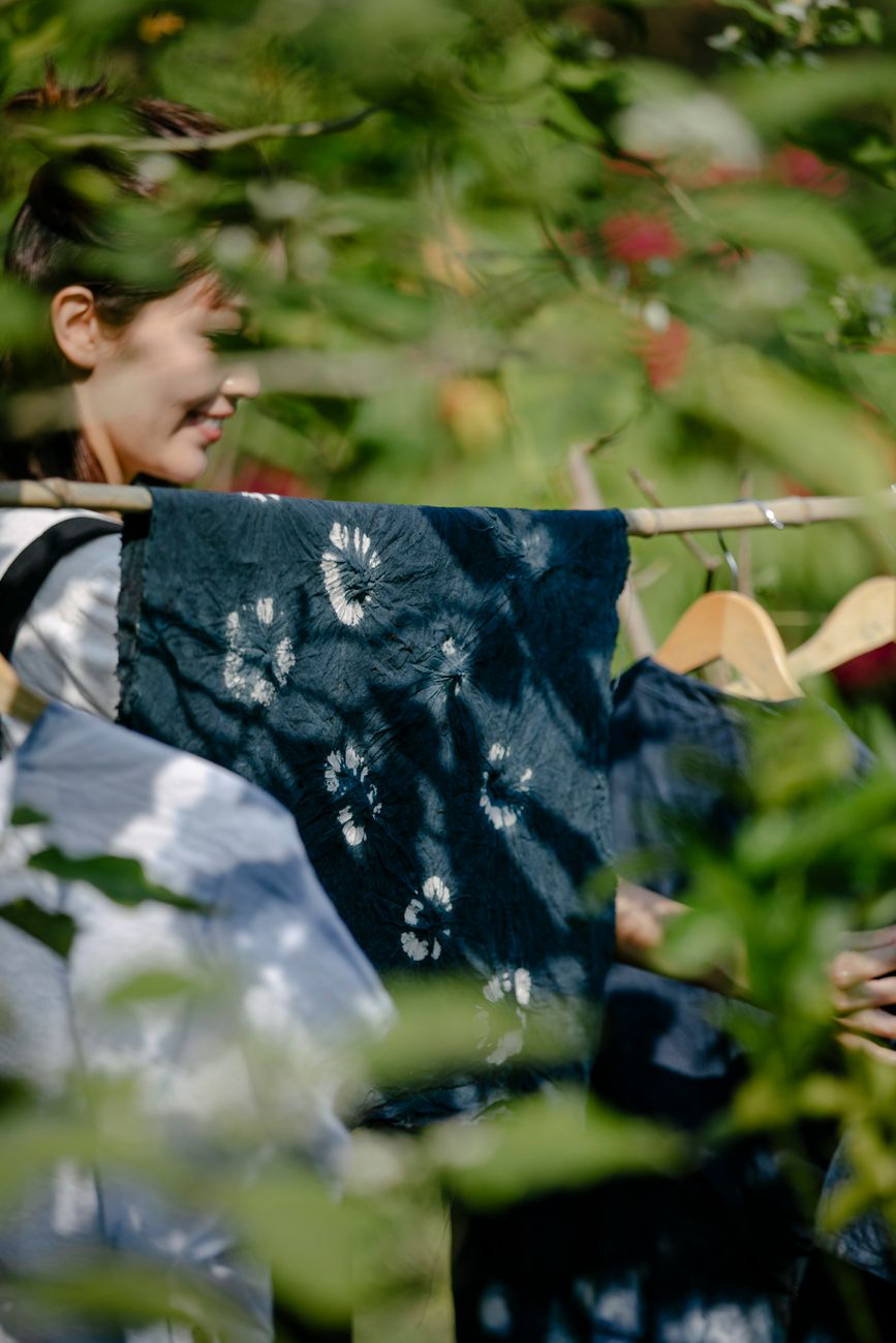 Traditional Japanese indigo-dyed fabric displaying deep blue gradations created through the ancient aizome dyeing technique.