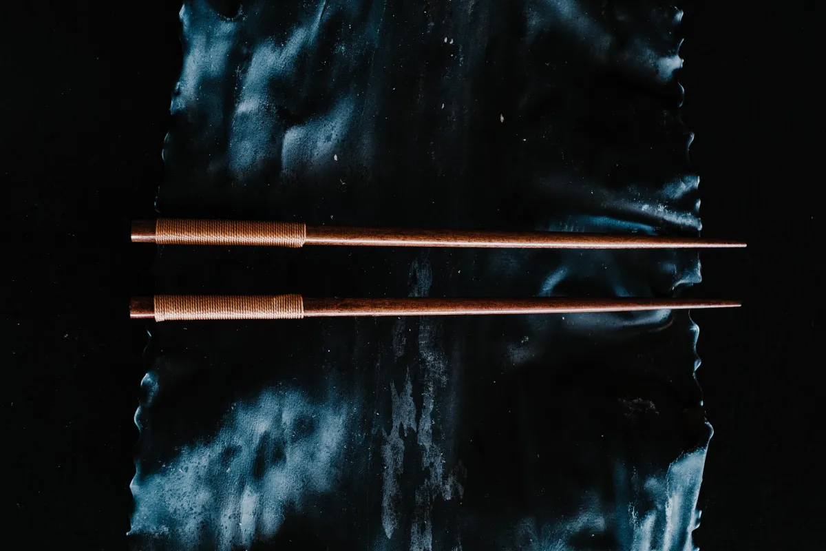 Several pairs of fine lacquered Japanese chopsticks displayed in different colours and patterns