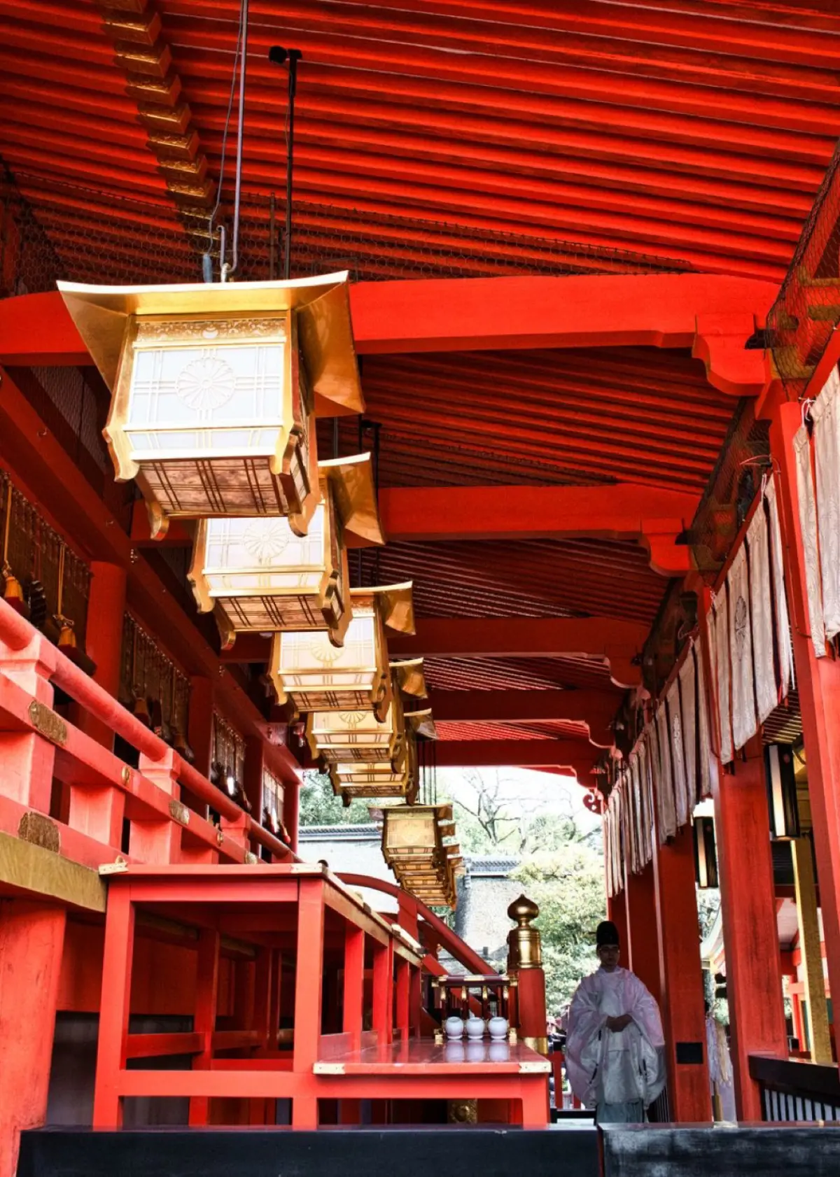 The intricate interlocking wooden bracket joints beneath the eaves of a traditional Japanese temple