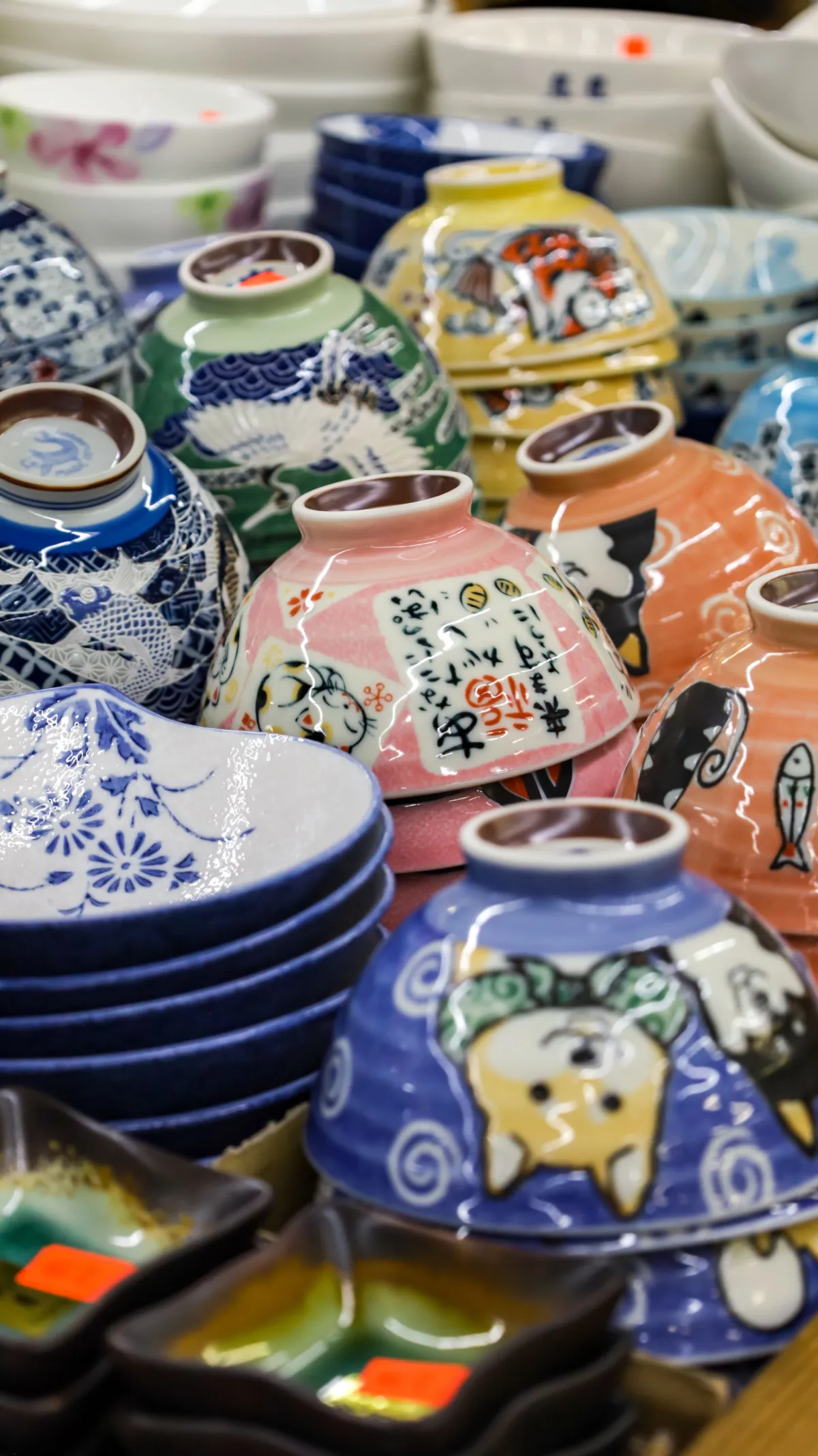 Traditional Arita porcelain kiln in Saga Prefecture with climbing noborigama structure built into hillside using centuries-old firing techniques.