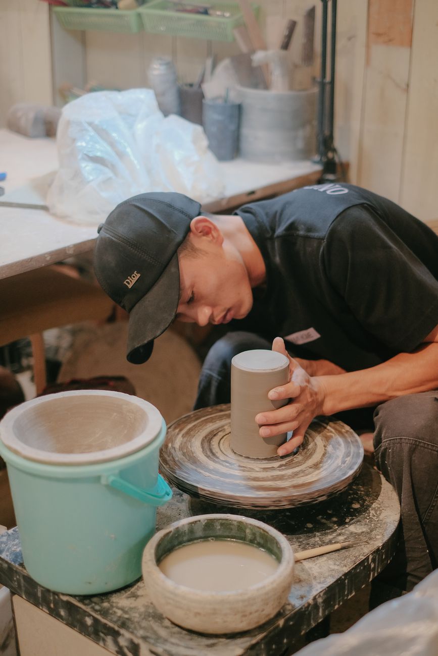 Traditional Seto ware ceramics displaying characteristic ash glaze and wheel-thrown forms from Japan's oldest pottery production center in Aichi Prefecture.
